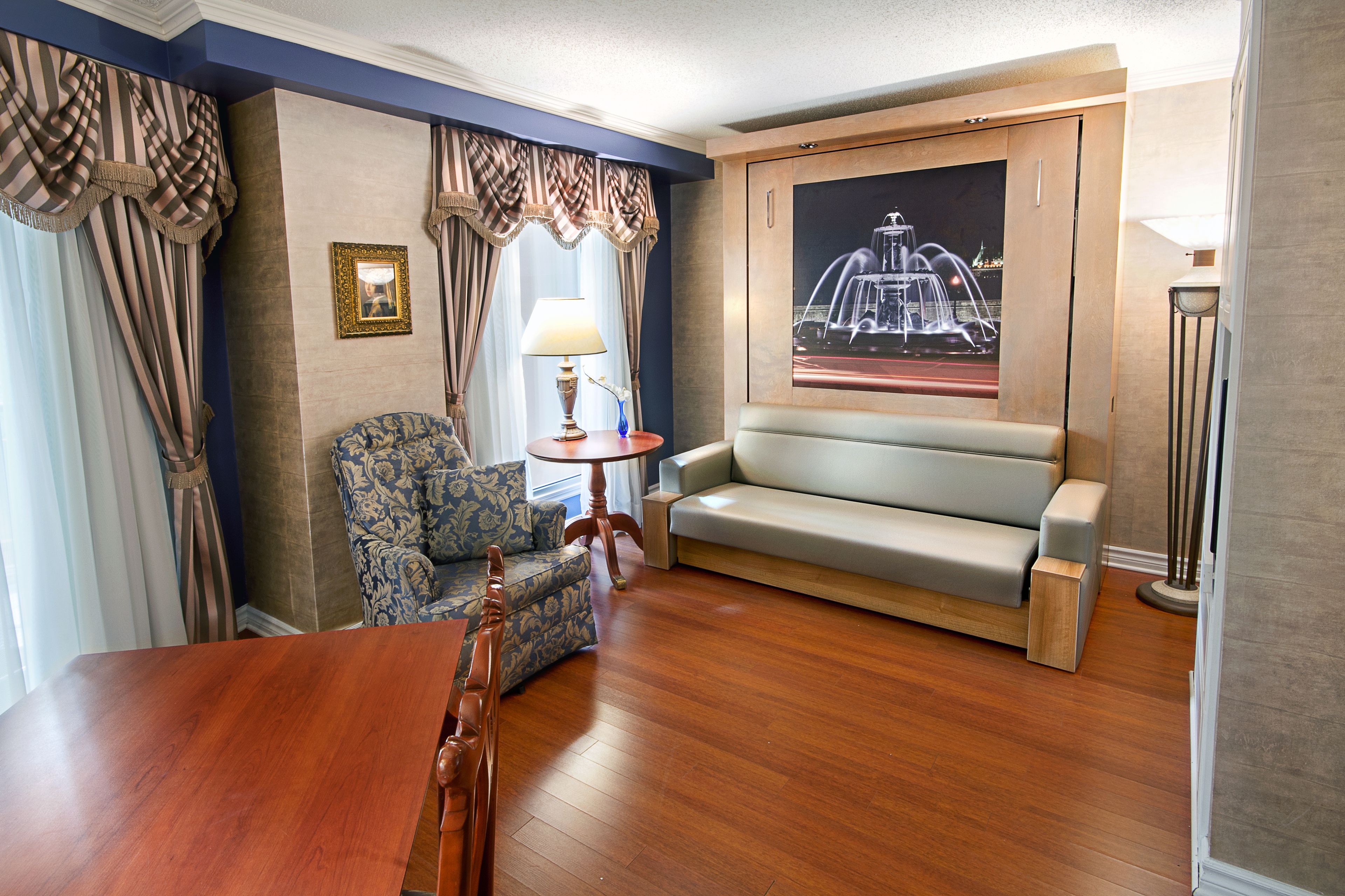 interior garden balcony suite, 1 queen bed and 1 queen murphy bed | living room | 32-inch flat-screen tv with cable channels, tv