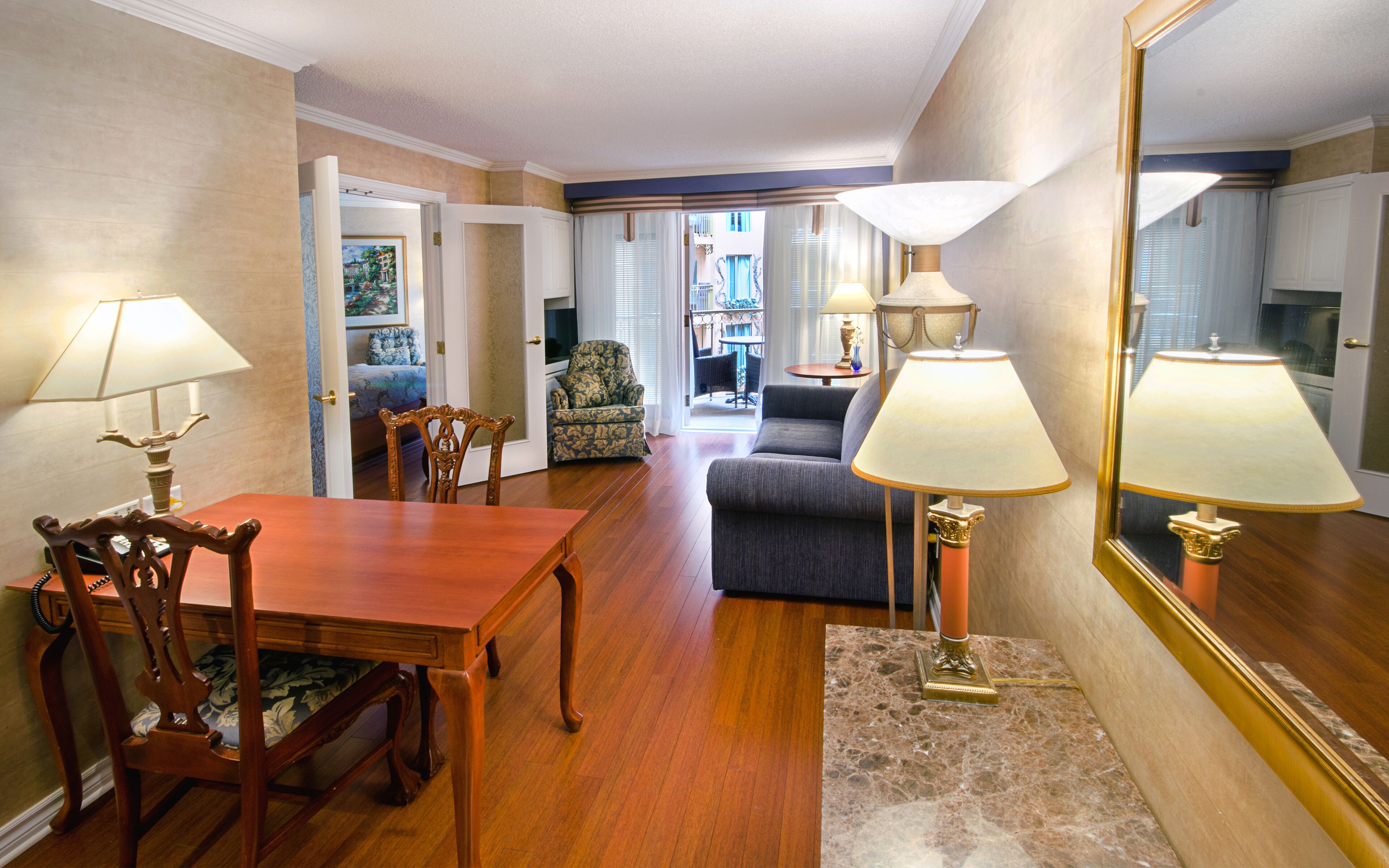 interior garden balcony family suite, 2 queen beds and sofa-bed | living area | 32-inch flat-screen tv with cable channels, tv