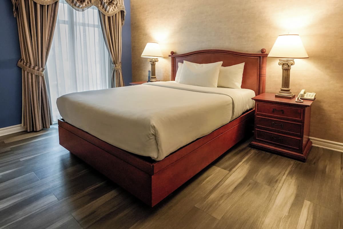 Interior Garden Balcony Suite, 1 Queen bed and 1 Queen Murphy Bed | Memory foam beds, in-room safe, desk, blackout drapes