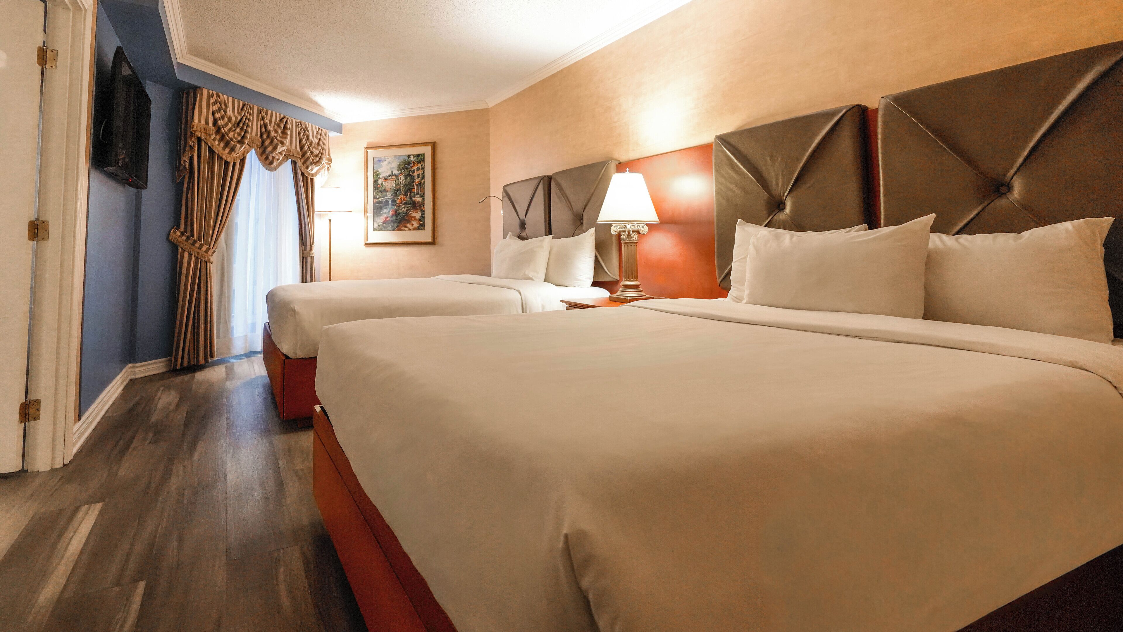 Interior Garden Balcony Family Suite, 2 Queen beds and Sofa-bed | Memory foam beds, in-room safe, desk, blackout drapes