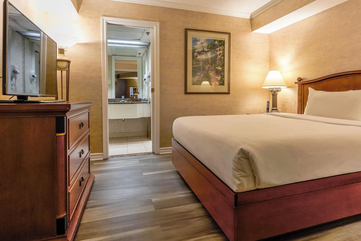 Interior Garden Balcony Suite, 1 Queen bed with sofa-bed | Memory foam beds, in-room safe, desk, blackout drapes