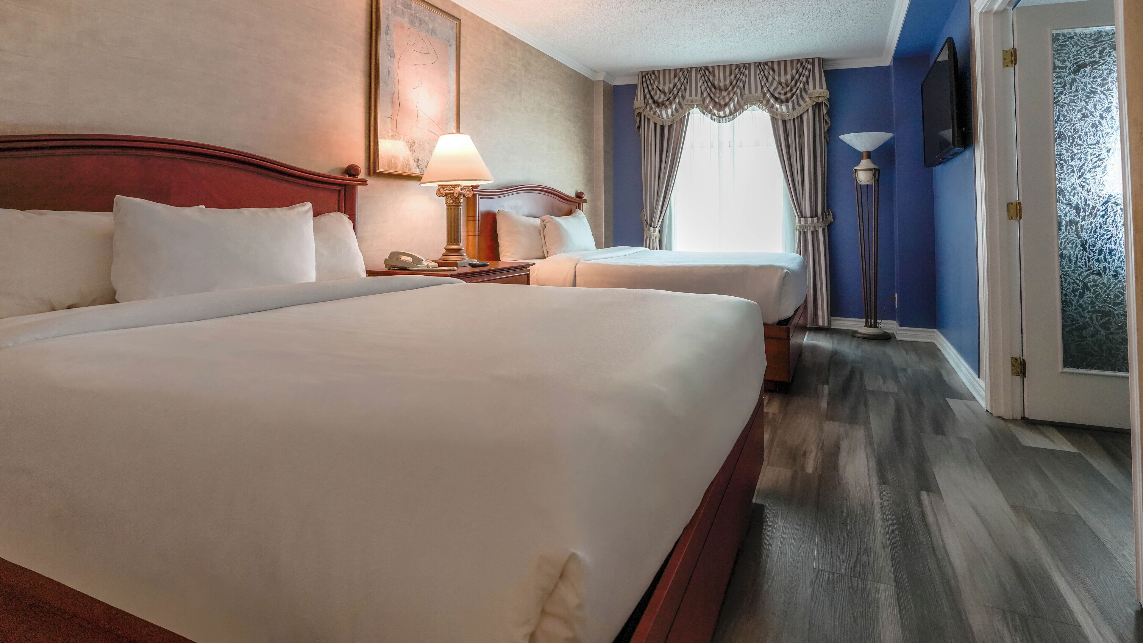 City View Family Suite, 2 Queen beds and Sofa-bed  | Memory foam beds, in-room safe, desk, blackout drapes