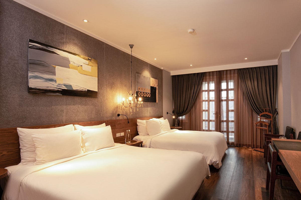 Family Room | 1 bedroom, premium bedding, minibar, in-room safe
