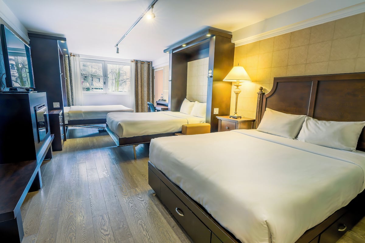 studio 1 queen bed and 2 queen murphy beds (one room) | 1 bedroom, premium bedding, memory-foam beds, in-room safe