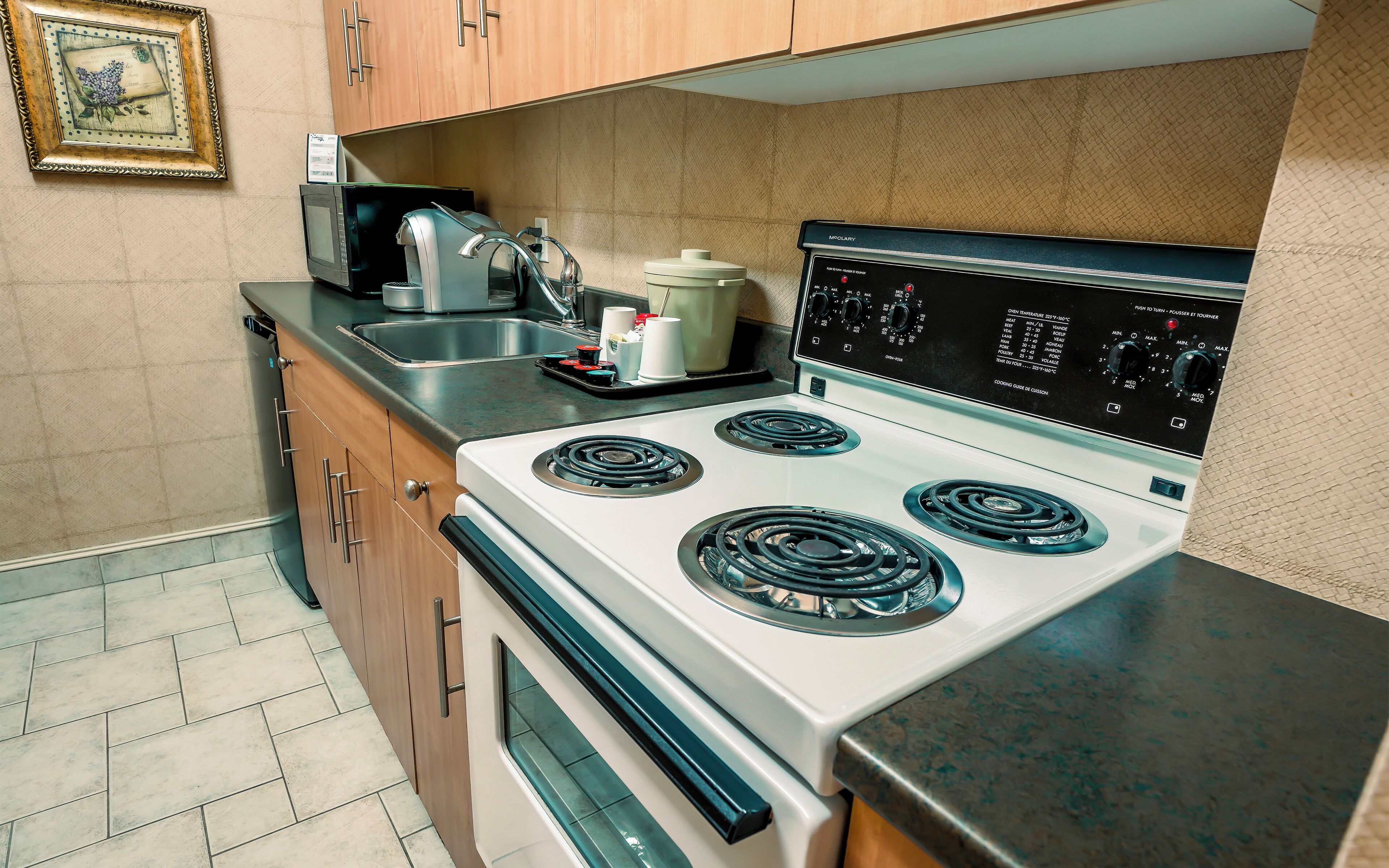 superior room, 2 queen murphy beds, kitchenette, garden view | private kitchen | fridge, coffee/tea maker