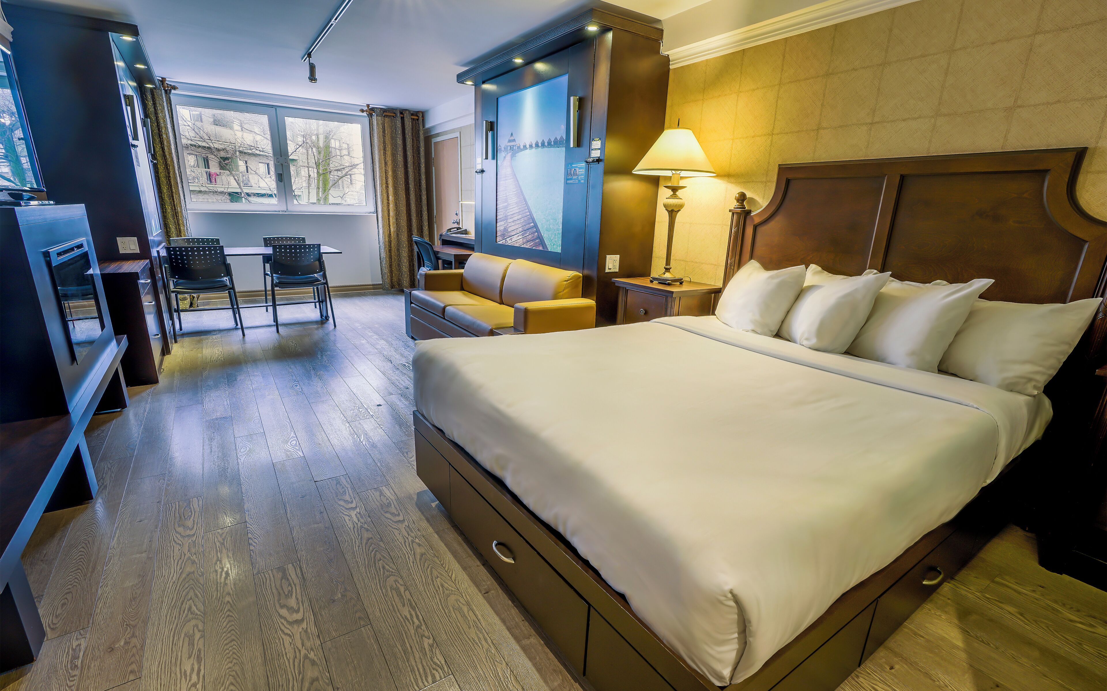 Studio 1 Queen bed and 2 Queen murphy beds (one room) | Premium bedding, memory foam beds, in-room safe, desk