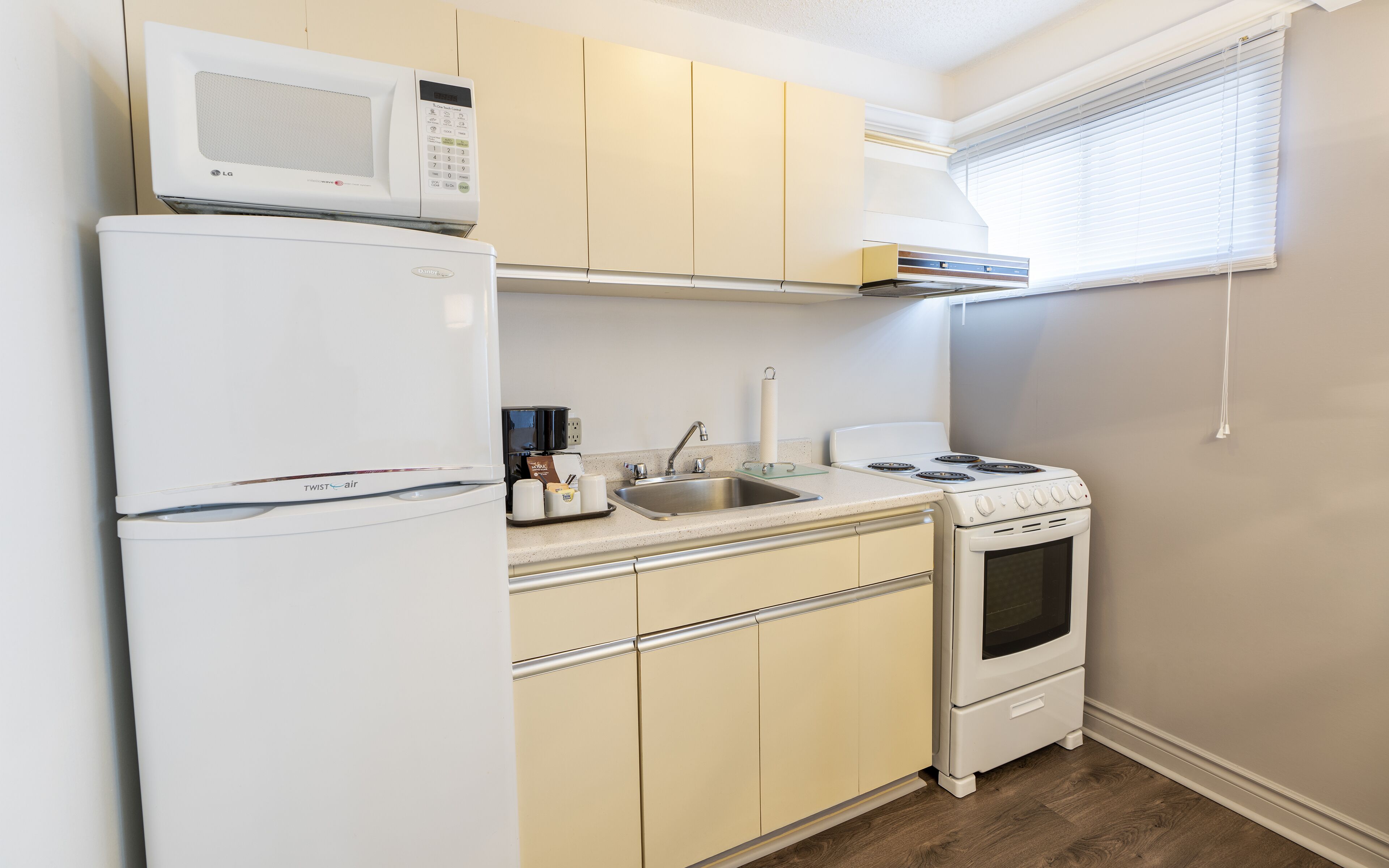 traditional room, 1 double murphy bed and 1 double sofa-bed with kitchenette - exterior view | private kitchenette | fridge, coffee/tea maker