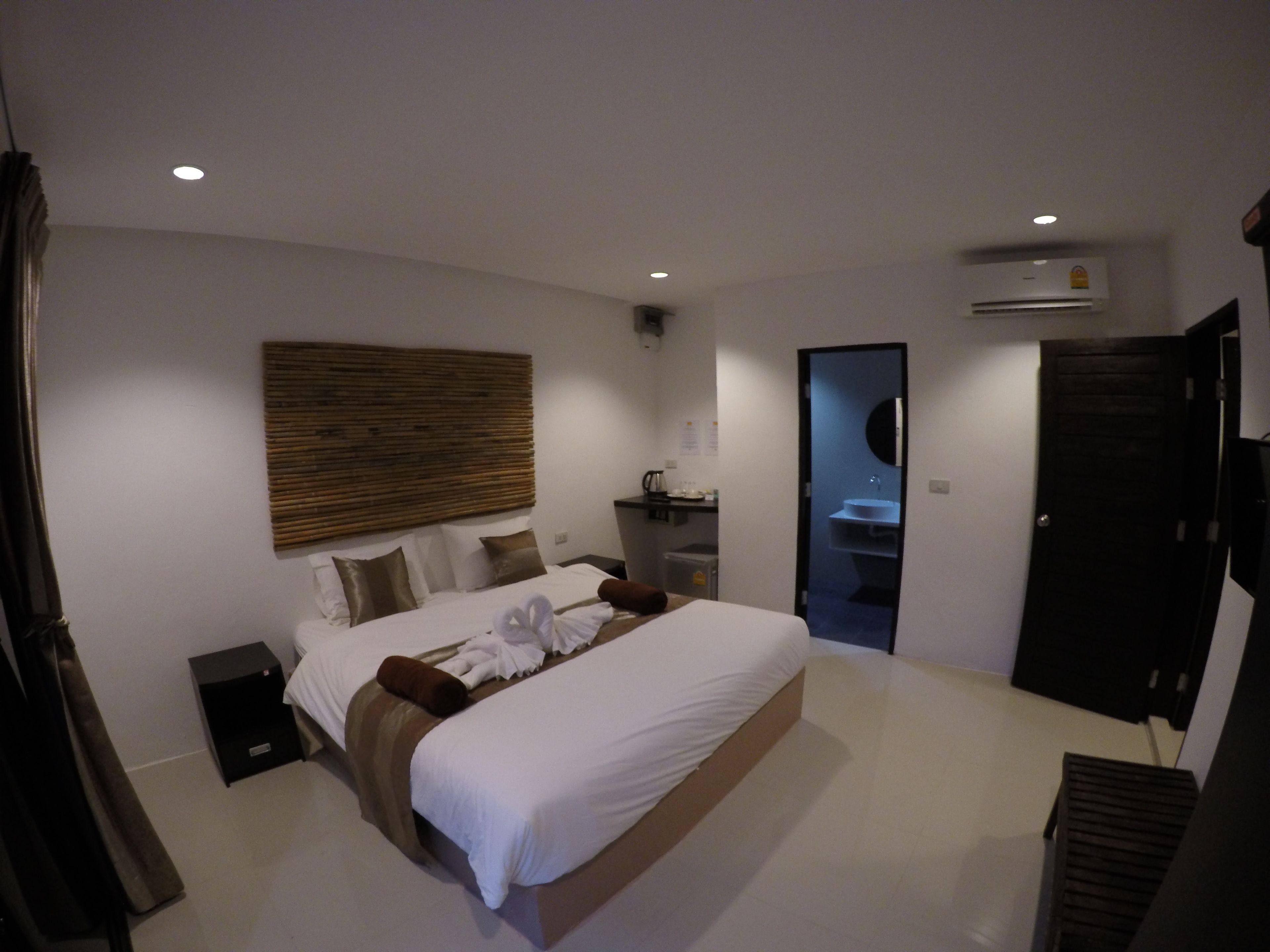 deluxe room, 2 bedrooms, non smoking, pool view | minibar, in-room safe, blackout curtains, rollaway beds