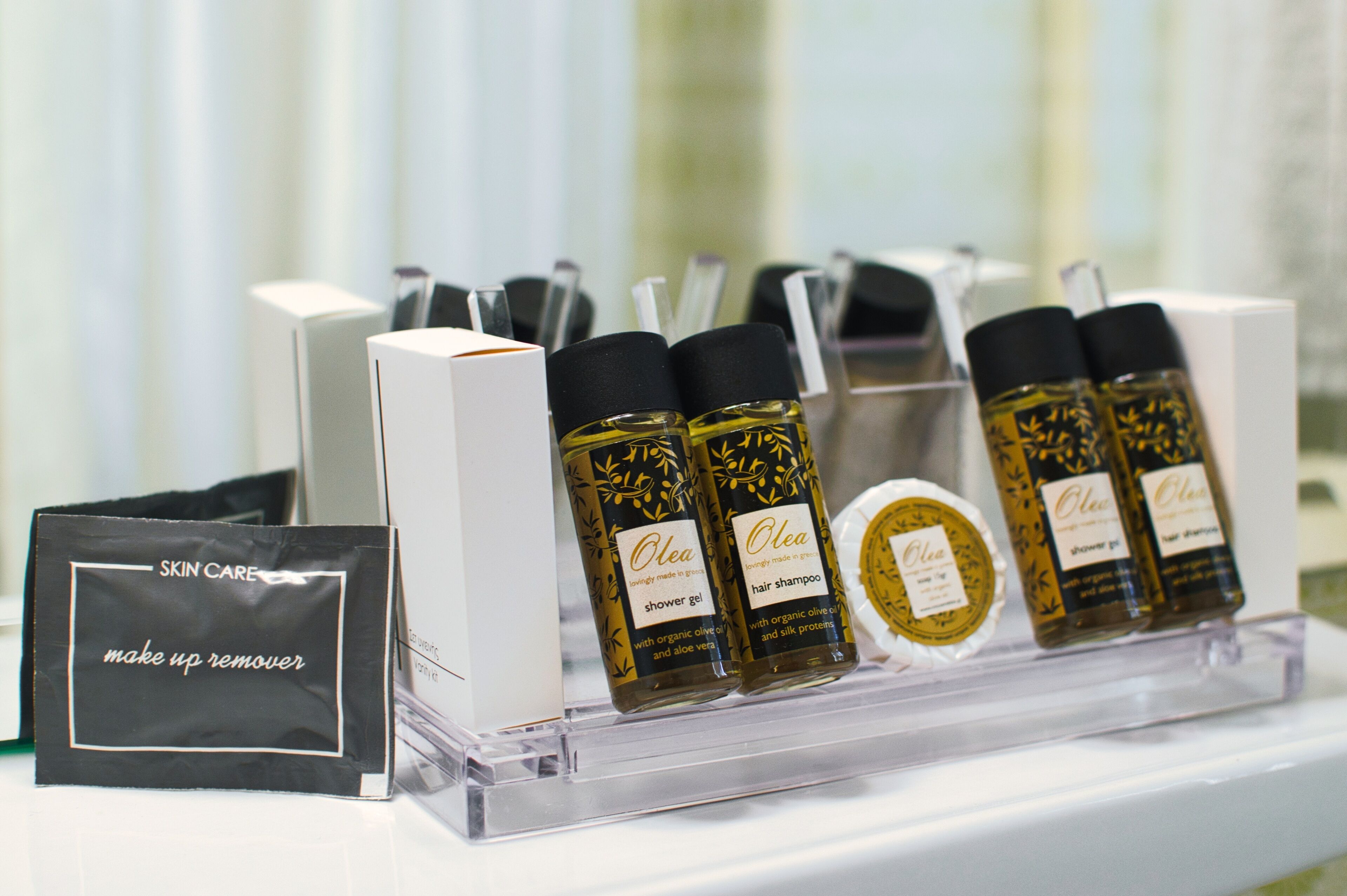 bathtub, designer toiletries, hair dryer, towels