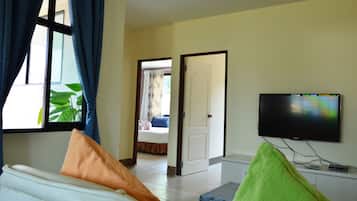 Family Junior Suite | Living area | Flat-screen TV