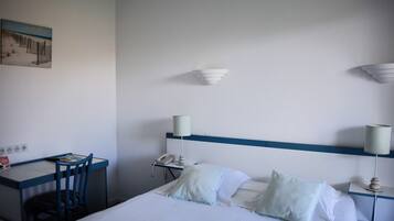 Double Room, Patio | Individually decorated, individually furnished, desk, blackout drapes