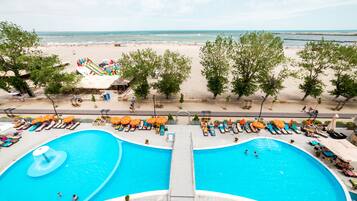 Outdoor pool, open 8:00 AM to 8:00 PM, pool umbrellas, sun loungers