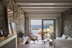 Grand Suite with private pool and sea view | Living area | 45-inch flat-screen TV with digital channels