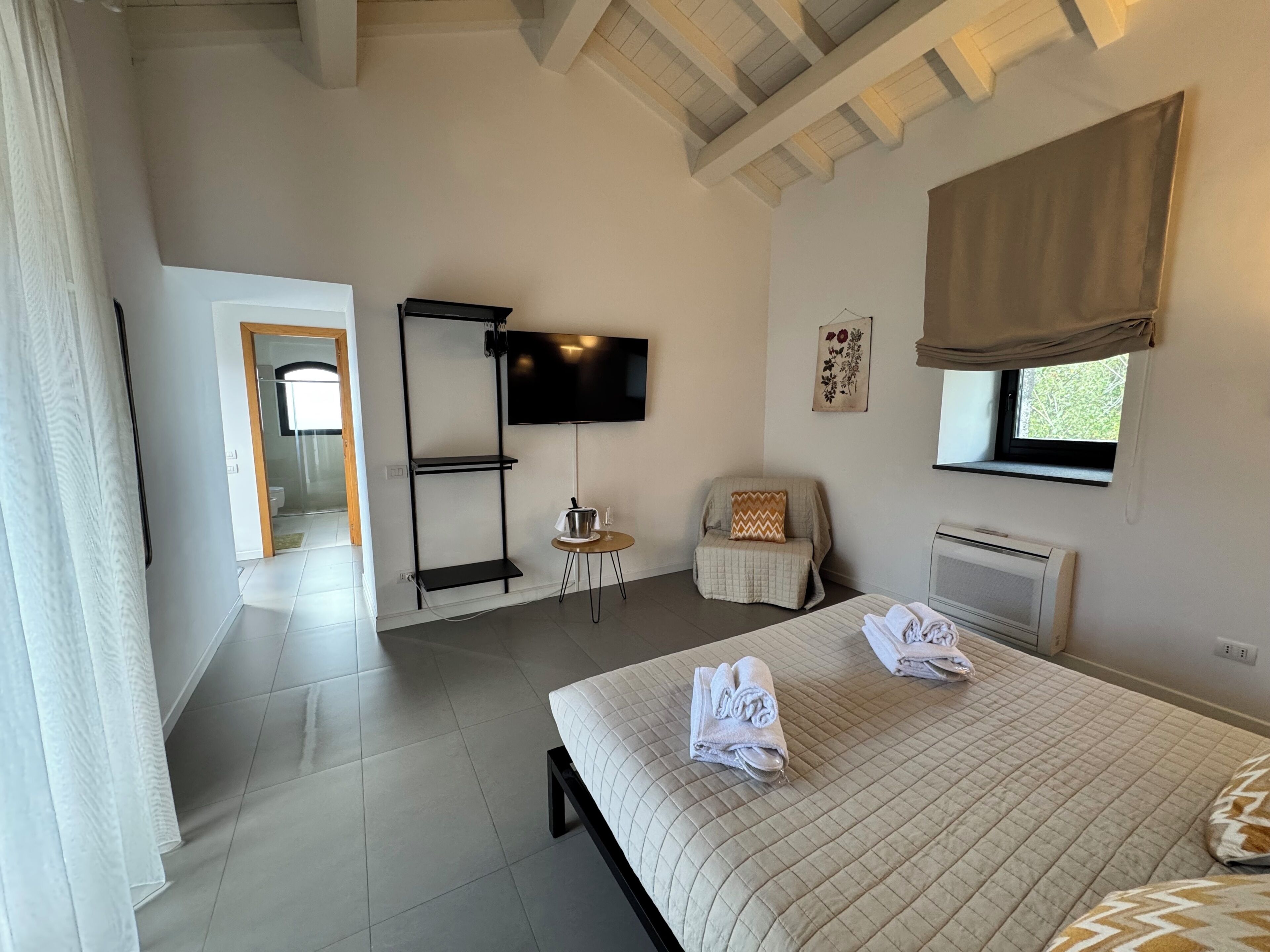 Departamento, 1 habitación, en edificio contiguo | Minibar, caja de seguridad en la habitación, escritorio y camas extra 