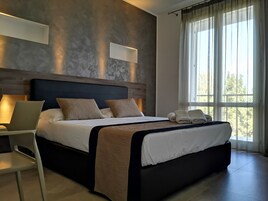 Ropa de cama de alta calidad y minibar 