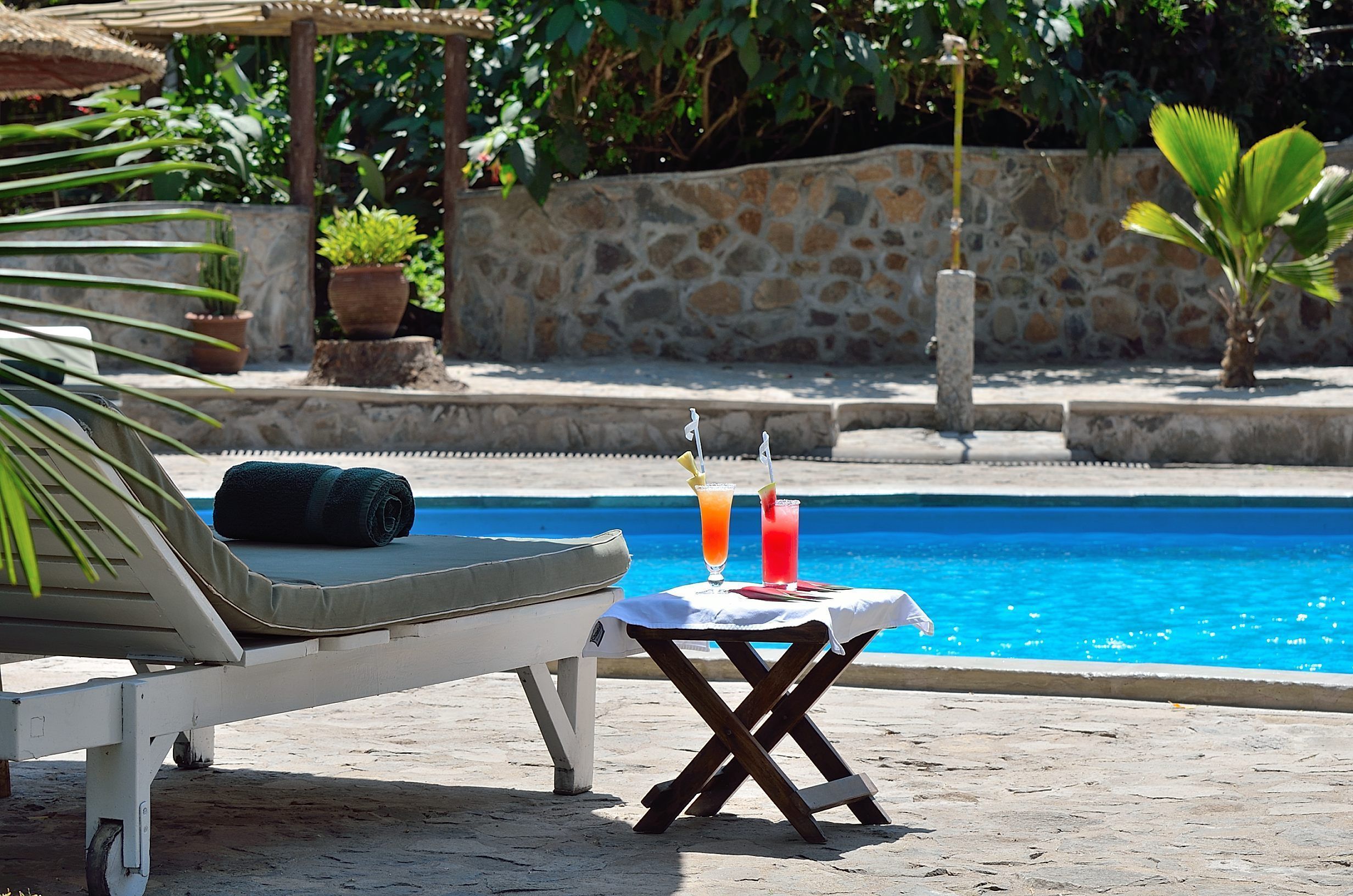Outdoor pool, pool umbrellas, pool loungers