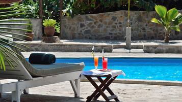 Outdoor pool, pool umbrellas, pool loungers