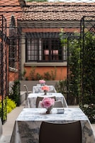 Breakfast, lunch, dinner served; Fusion cuisine, pool views