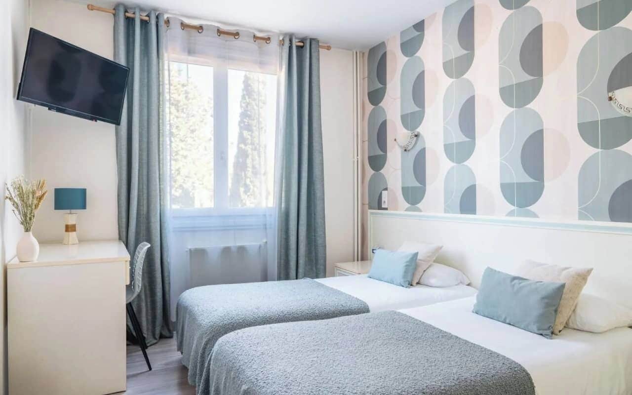 twin room | premium bedding, select comfort beds, desk, soundproofing