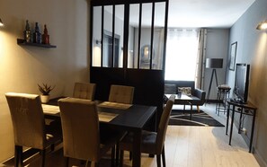 Classic Apartment | Living area | 25-inch flat-screen TV with digital channels, TV