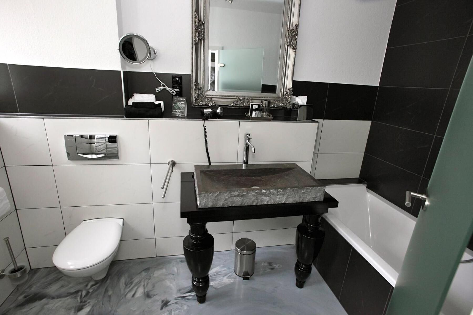 designer toiletries, hair dryer, bathrobes