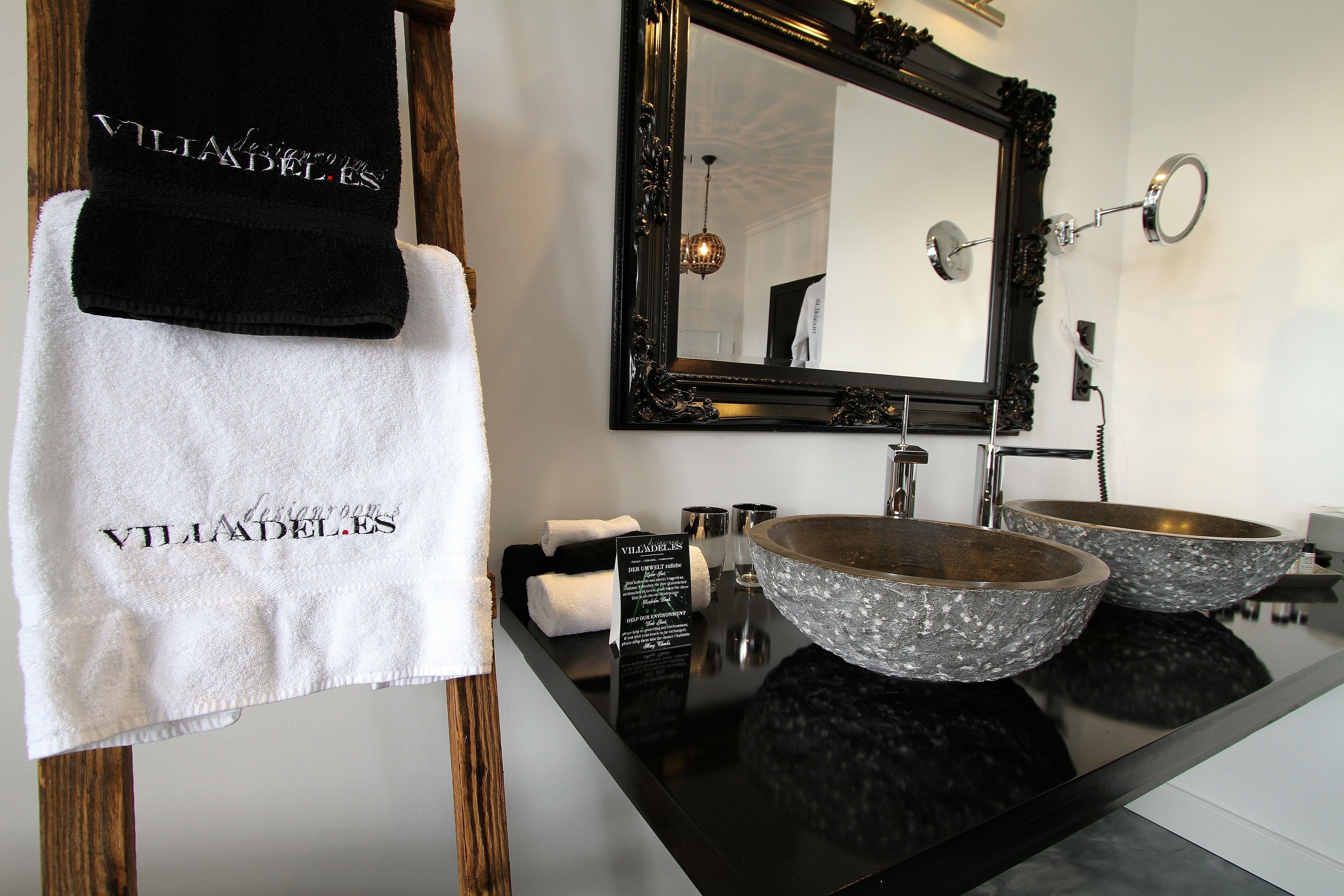 designer toiletries, hair dryer, bathrobes