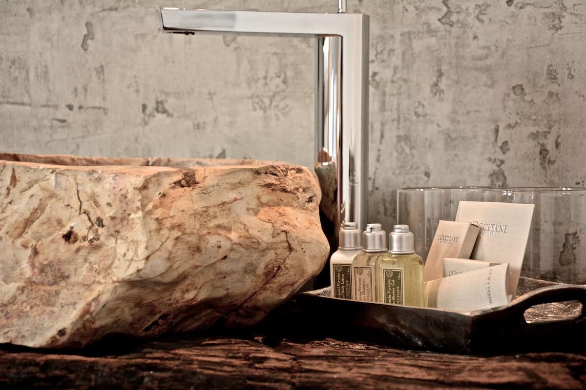 designer toiletries, hair dryer, bathrobes