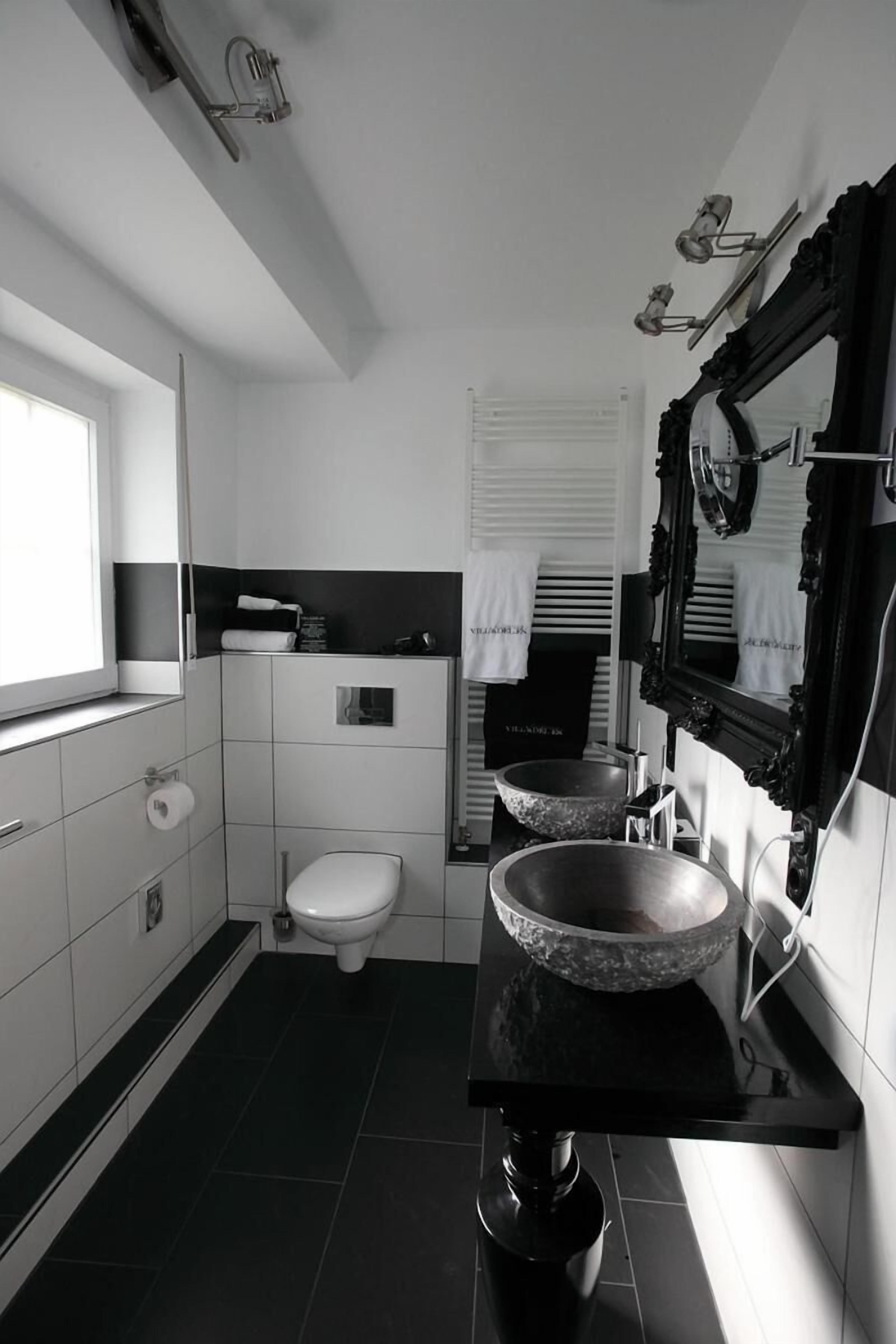 designer toiletries, hair dryer, bathrobes