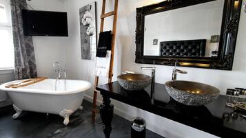 Designer toiletries, hair dryer, bathrobes