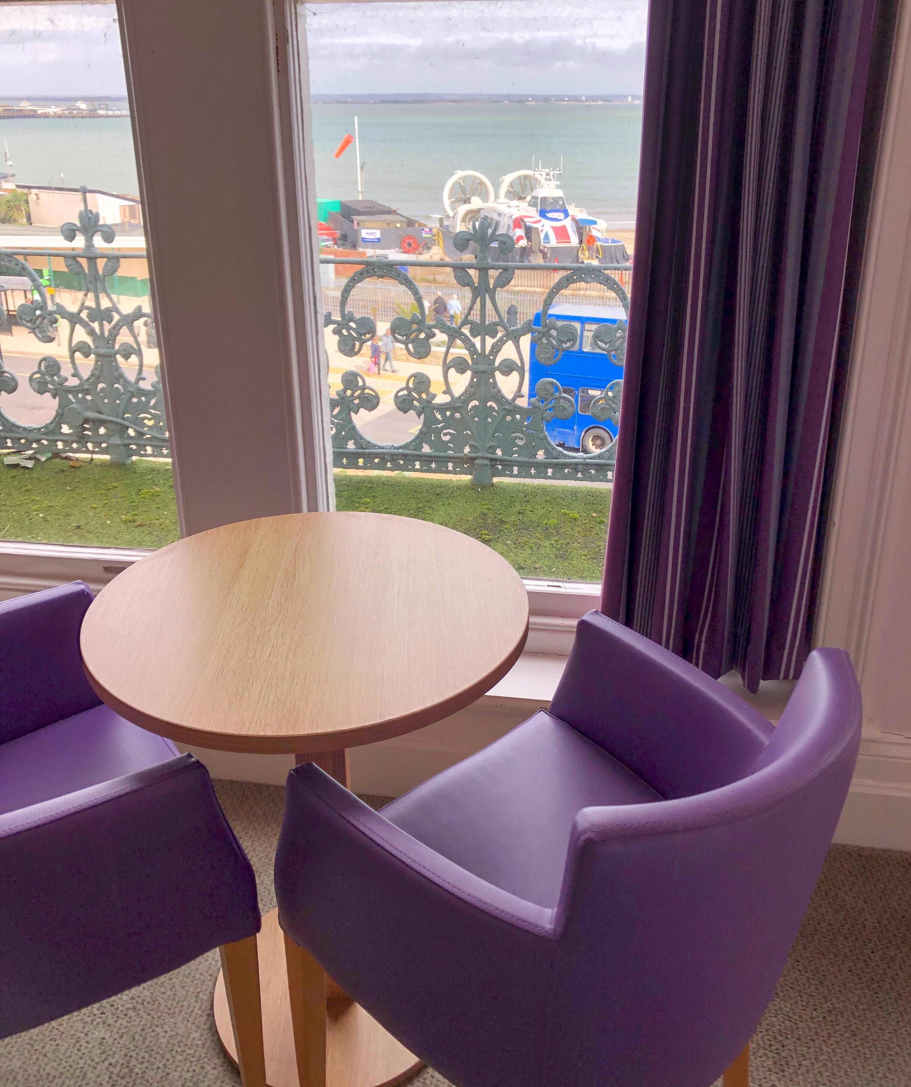 Family Room | Desk, iron/ironing board, bed sheets