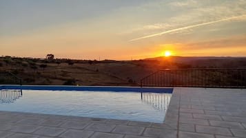 Seasonal outdoor pool, pool umbrellas, sun loungers