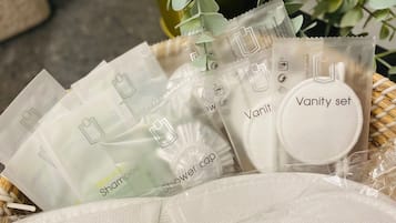 Hair dryer, towels, soap, shampoo