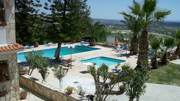 Apartment, 1 Bedroom | Pool | Seasonal outdoor pool, pool umbrellas, pool loungers