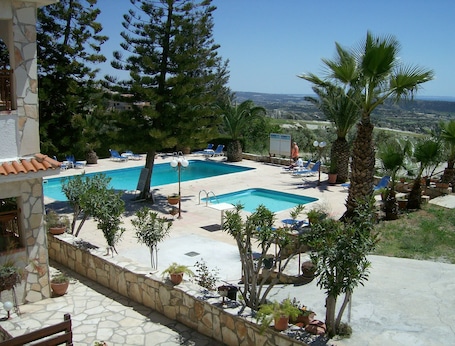Apartment, 1 Bedroom | Pool | Seasonal outdoor pool, pool umbrellas, sun loungers