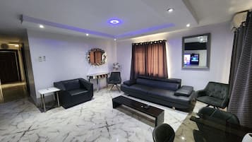 50-inch flat-screen TV with satellite channels, Smart TV, DVD player