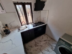 Full-sized fridge, microwave, stovetop, electric kettle