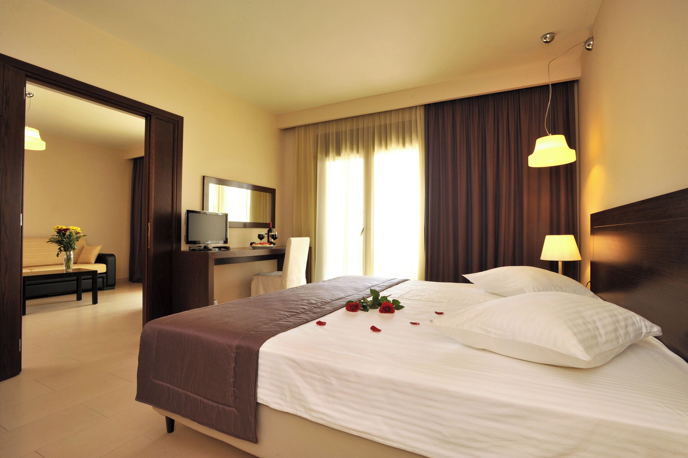 Deluxe Suite, Private Pool | Minibar, in-room safe, desk, laptop workspace