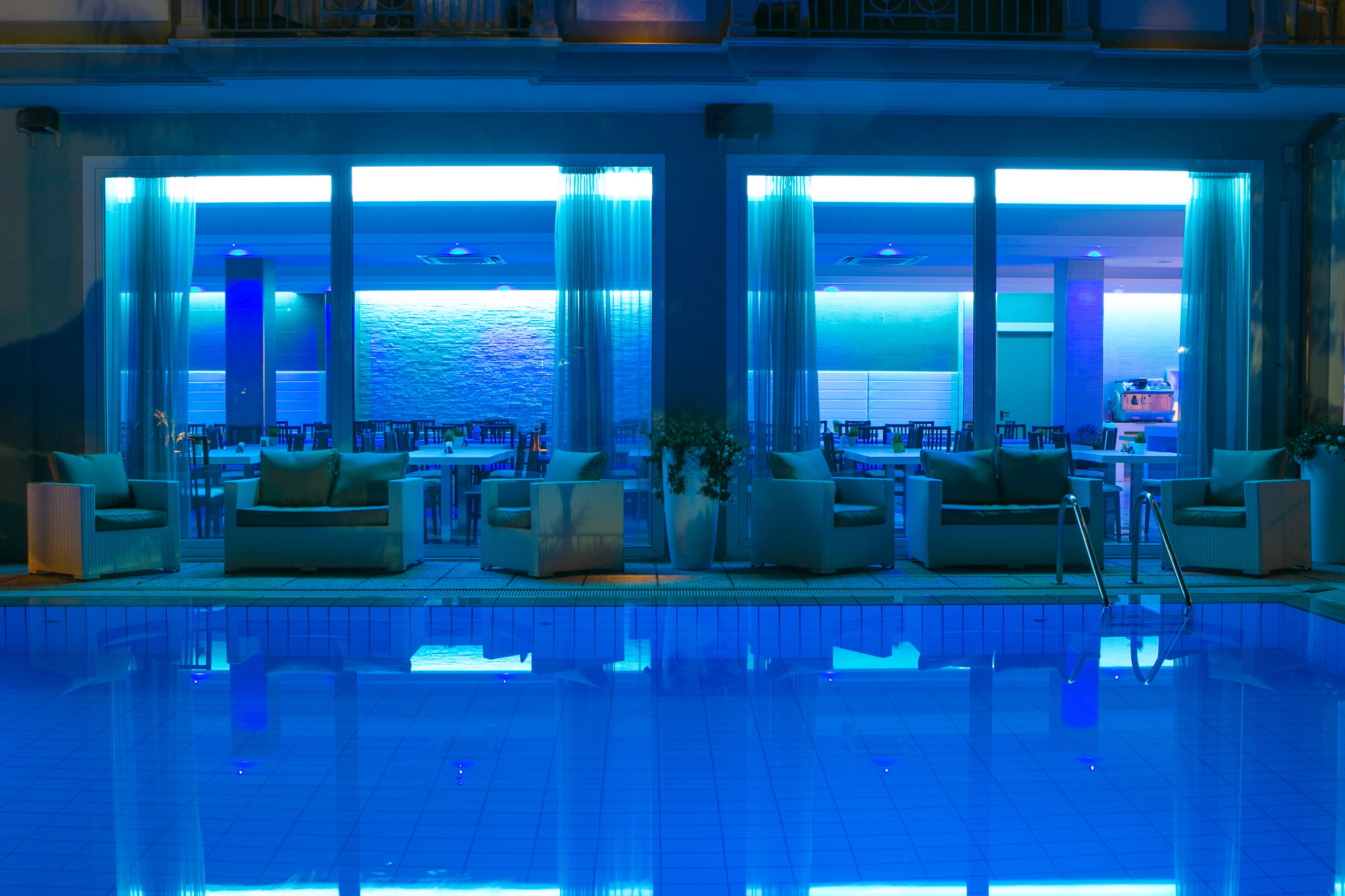 seasonal outdoor pool, an infinity pool, pool loungers