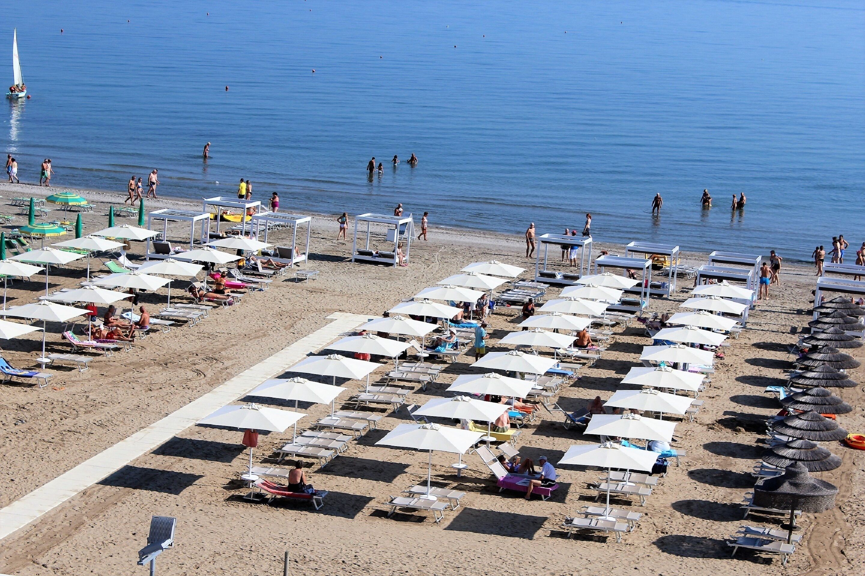 Private beach, sun loungers, beach umbrellas, beach volleyball