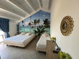 Habitación triple Confort, balcón, vistas parciales al mar (beach access included) | Caja fuerte, wifi gratis, ropa de cama