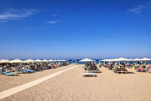 Private beach, sun loungers, beach umbrellas, beach volleyball