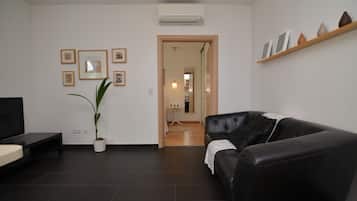 Comfort Apartment, 1 Bedroom, Terrace | Living room | Flat-screen TV