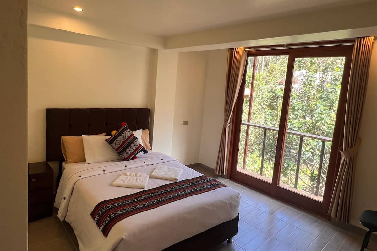 Dobbelt- eller tomannsrom – deluxe | Sengetøy av topp kvalitet, dundyner og individuelt dekorert