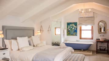 Luxury Double Room, Multiple Beds | Bathroom | Free toiletries, hair dryer, bathrobes, towels