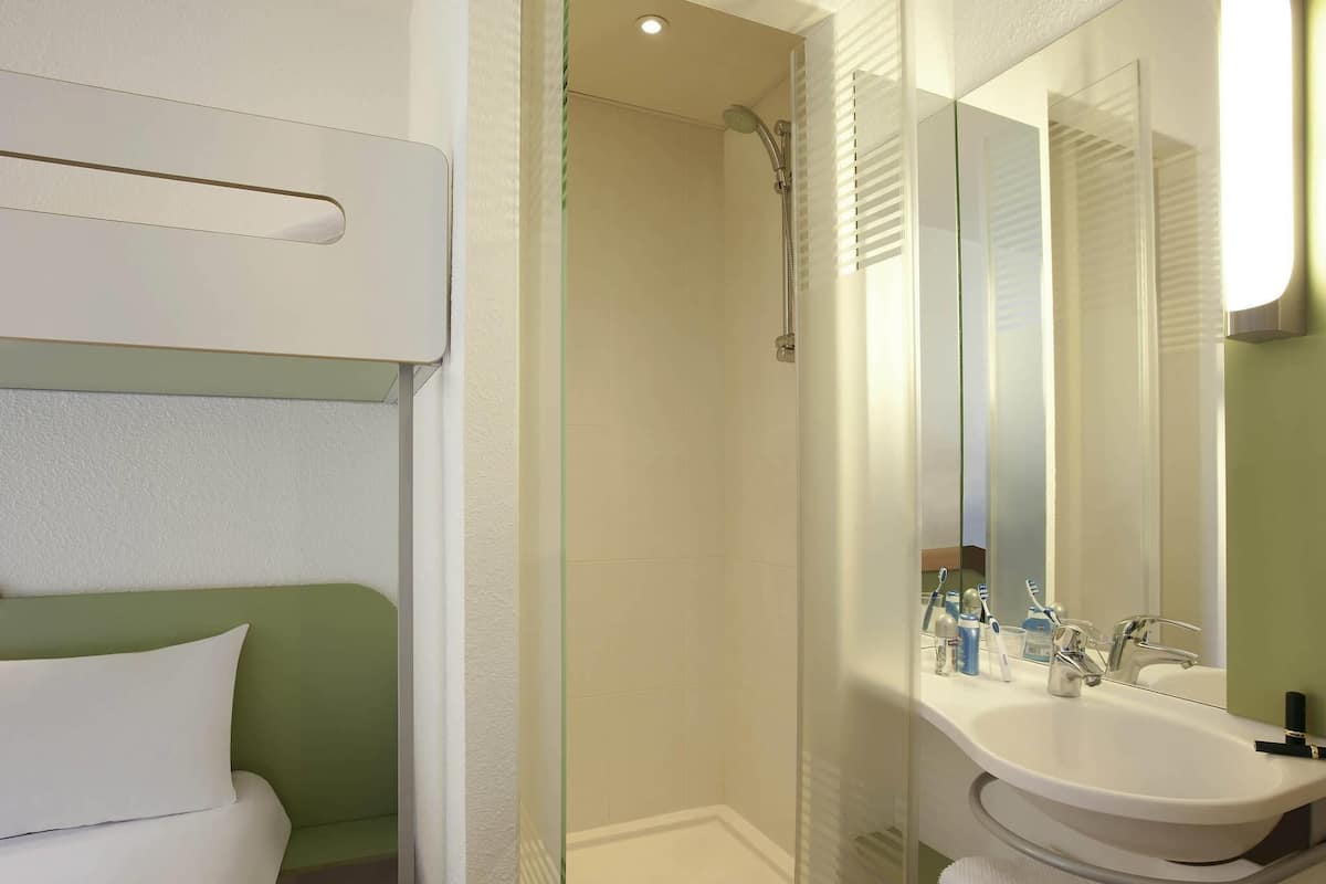 Desk, blackout drapes, soundproofing, free WiFi