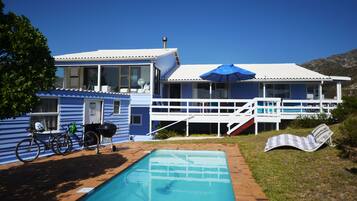 Outdoor pool, pool umbrellas, sun loungers