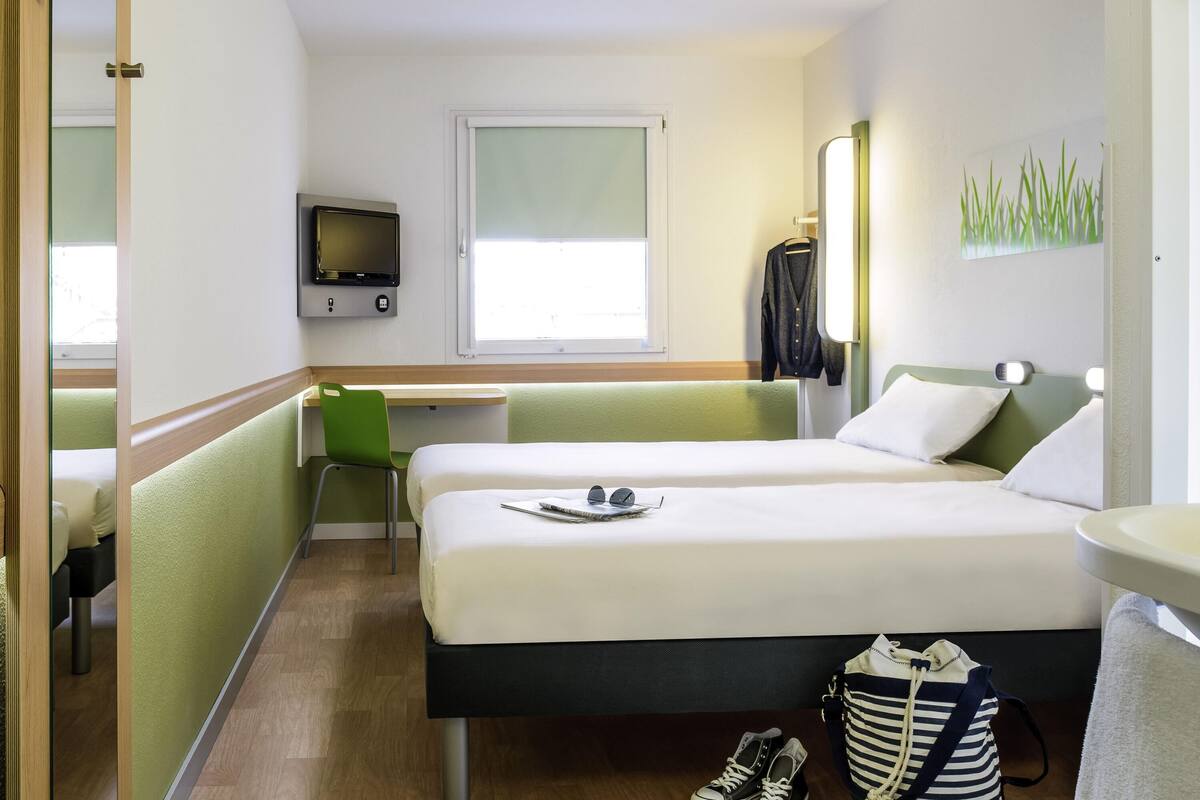 twin room, 2 single beds | desk, laptop workspace, blackout curtains, soundproofing