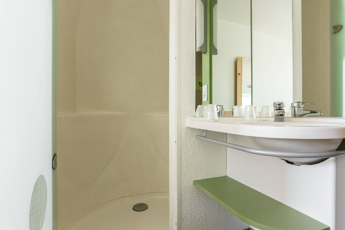 shower, eco-friendly toiletries, hair dryer, towels