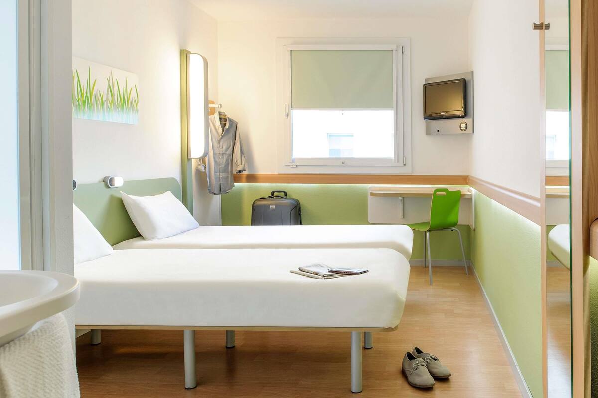 triple room, multiple beds | desk, blackout curtains, soundproofing, iron/ironing board