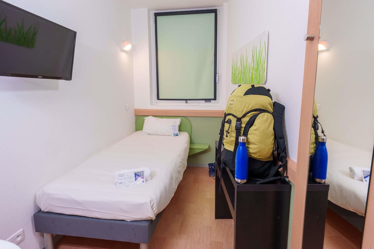 Habitación individual, 1 cama individual | Escritorio, cortinas blackout, insonorización y wifi gratis